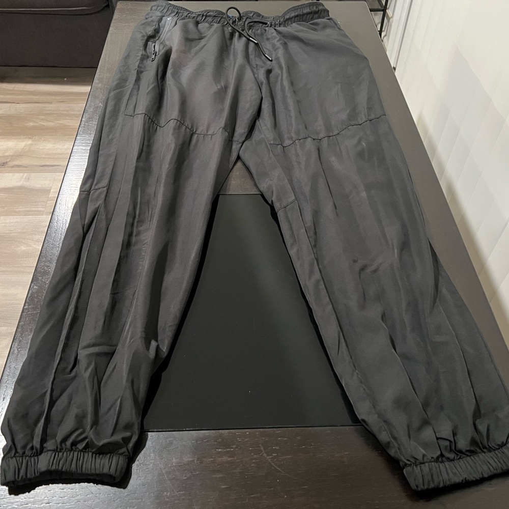 Divided Black Sweatpants